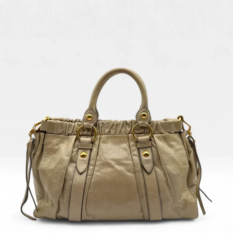 Pre-owned Miu Miu handbag Vitello Lux with shoulder strap made of beige leather