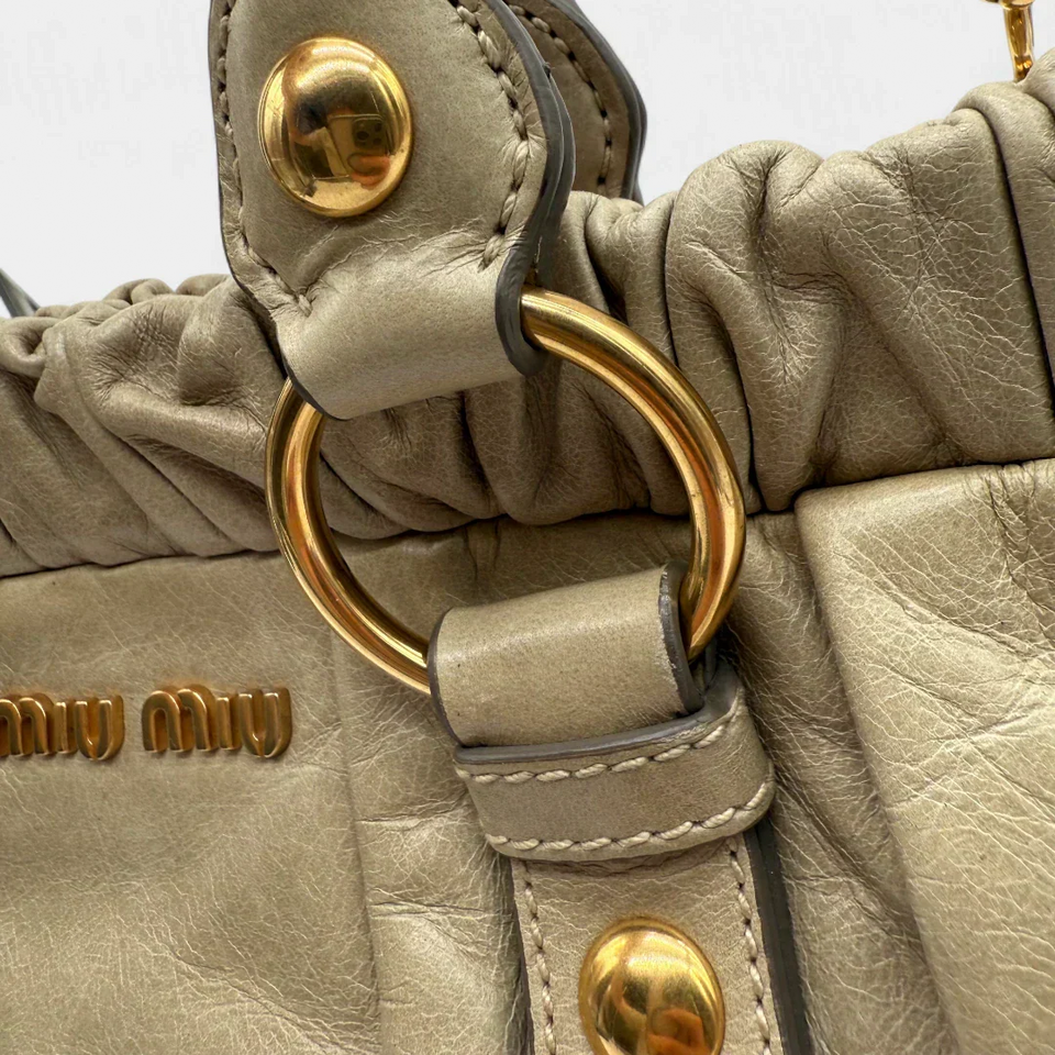 Pre-owned Miu Miu handbag Vitello Lux with shoulder strap made of beige leather